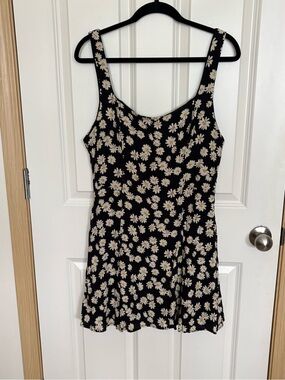 B. Smart Black Tank with Cream Daisy Print and Yellow Centers